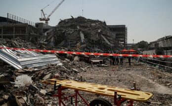 At least 144 dead and 117 trapped under skyscraper after devastation caused by 7.7 earthquake